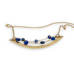 Brass hammered arch necklace with lapis faceted gemstone variety on gold filled chain