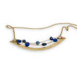 Brass hammered arch necklace with lapis faceted gemstone variety on gold filled chain