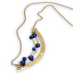 Brass hammered arch necklace with lapis faceted gemstone variety on gold filled chain