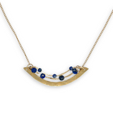 Brass hammered arch necklace with lapis faceted gemstone variety on gold filled chain