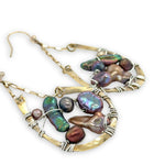 multi color fresh water pearl collection inside open hammered brass hoop earrings hanging from gold filled box chain