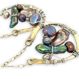 multi color fresh water pearl collection inside open hammered brass hoop earrings hanging from gold filled box chain
