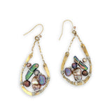 multi color fresh water pearl collection inside open hammered brass hoop earrings hanging from gold filled box chain