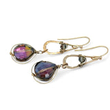 A pair of gold-filled wrapped fuchsia two-toned hematite crystal drop earrings with a hammered bronze mini drop and a crystal accent on gold filled earring hooks