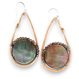 Iridescent abalone shell coins are surrounded by mauve moonstone gems within bronze teardrop earrings