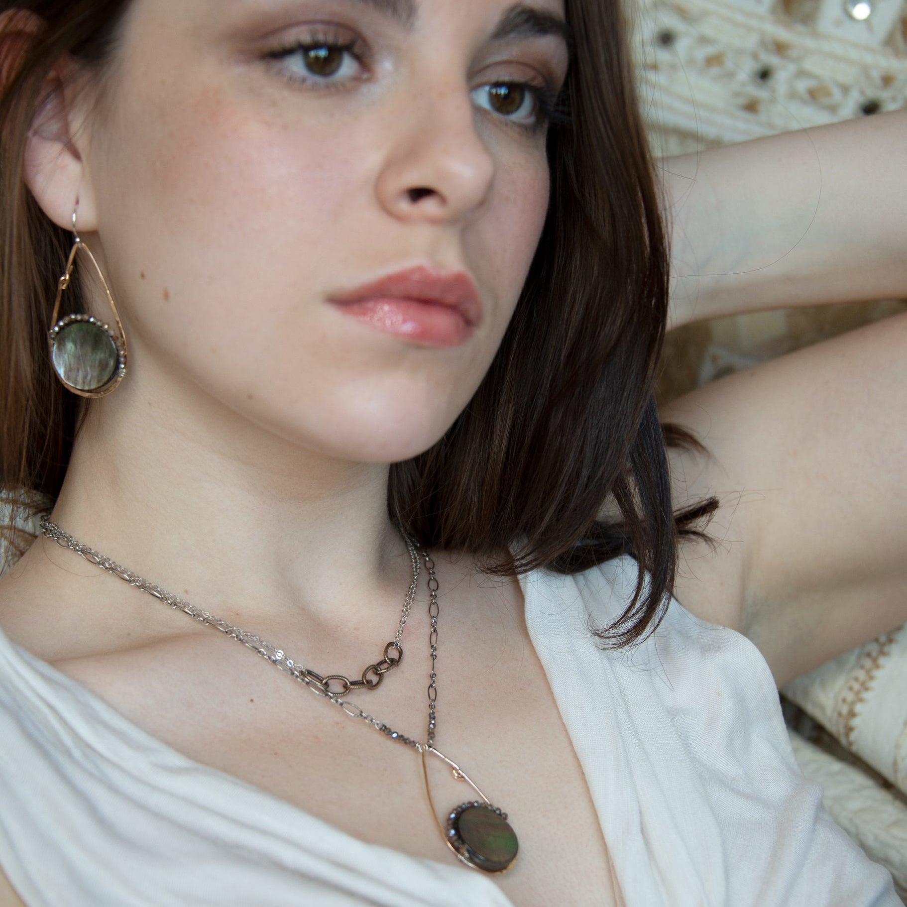 Bronze drop necklace with round abalone shell lined with moonstone gemstones on sterling silver double chain with brass link accents necklace