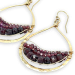 Fat hammered brass drop earrings layered with faceted garnet gemstone variety in gold filled wire