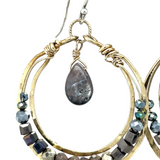 hammered brass channel hoops lined with smokey quarts, pyrite, and crystal gemstones with a smooth labradorite drop dangle