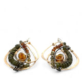 Handmade hammered bronze layered drop earrings with oxidized sterling twist wire, ombre orange to green hessonite and vesuvianite gemstones with an orange sparkling crystal accent