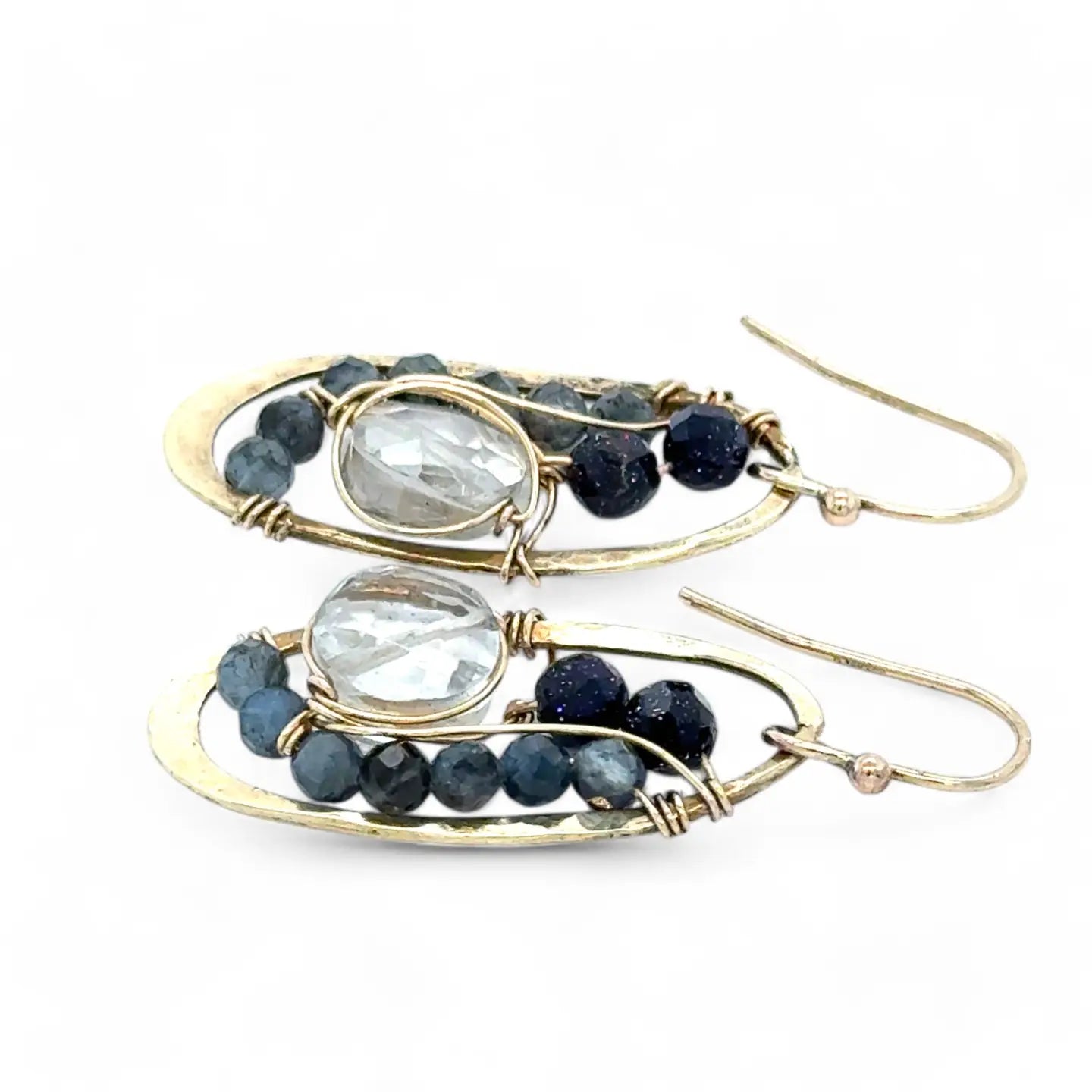 hammered mini brass oval earrings with faceted quartz coins wrapped in gold filled wire accented with aquamarine and blue goldstone gemstones