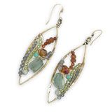 Green amethyst nuggets surrounded by labradorite, hessonite garnet, citrine, crystal, and amazonite gemstones wrapped in sterling silver and brass twist wires on a handmade hammered brass marquise earrings