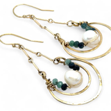 Brass channel hoop earrings lined with round fresh water pearl and blue tourmaline gemstones with gold filled bar chain on top and gold filled earring hooks