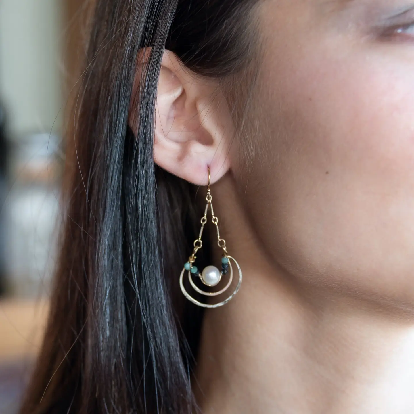 Brass channel hoop earrings lined with round fresh water pearl and blue tourmaline gemstones with gold filled bar chain on top and gold filled earring hooks