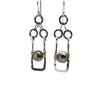Sterling silver mini rectangle earrings holding faceted pyrite coin gemstones wrapped in gold filled wire, hanging from darkened sterling silver crinkle chain 