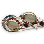 Small sterling silver hammered drop earrings embellished with glowing smooth moonstone oval wrapped in bronze wire and faceted hessonite gemstones