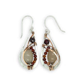 Small sterling silver hammered drop earrings embellished with glowing smooth moonstone oval wrapped in bronze wire and faceted hessonite gemstones