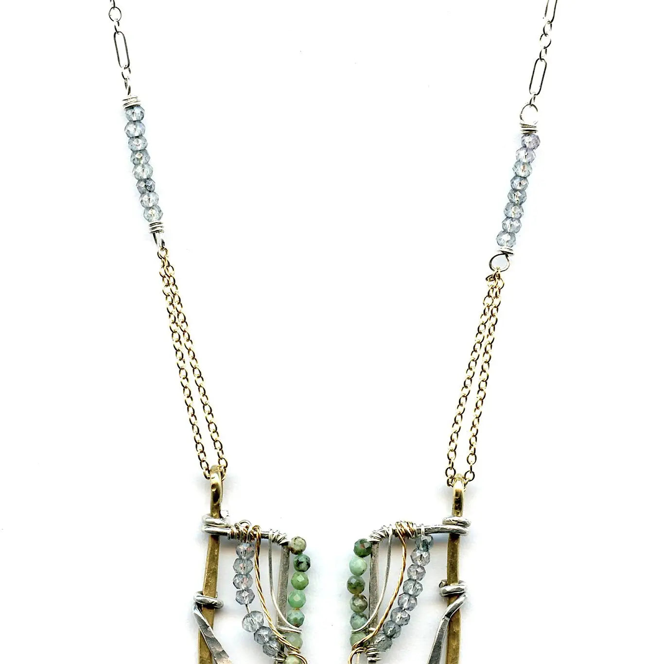 Handmade brass and sterling silver horseshoe pendant beaded with chrysocolla, turquoise, and blue quartz on a mixed sterling silver and gold filled chain
