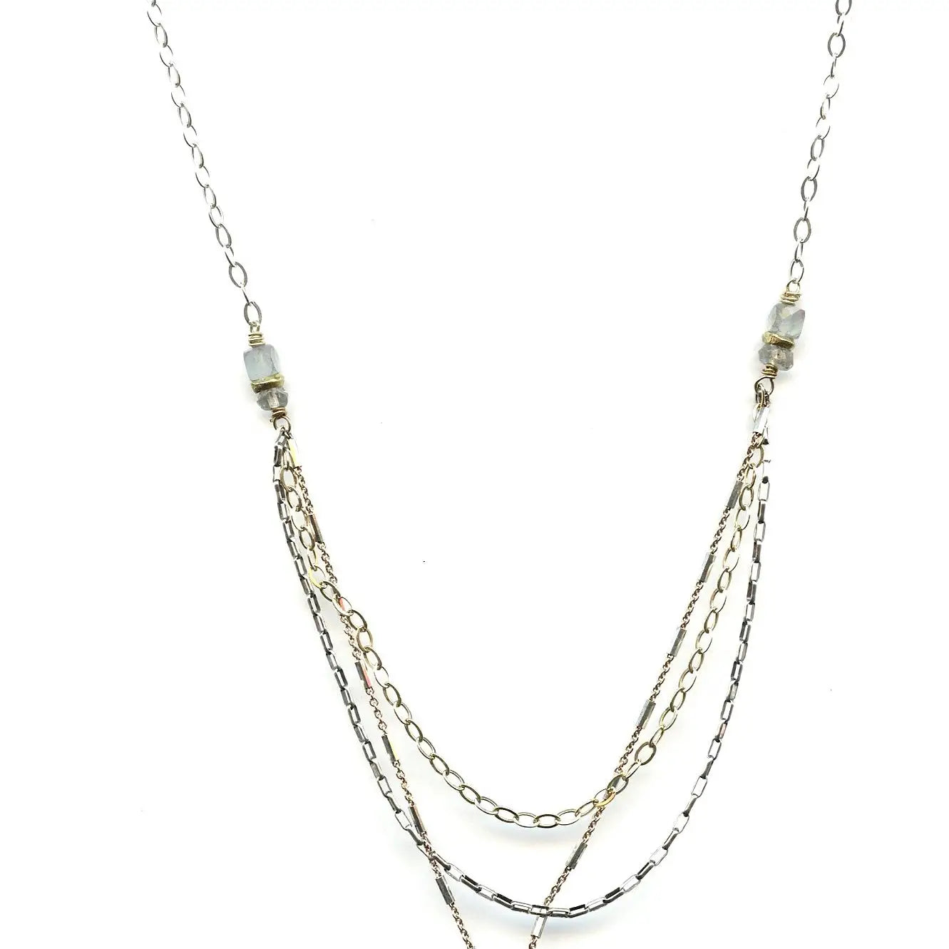Flashy labradorite smooth rectangle gemstone held in a brass hammered handmade box pendant accented with sterling silver and a faceted green amethyst cube. Necklace features a triple chain, sterling silver and gold filled chains