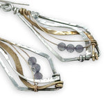 oxidized sterling silver arrow shaped earrings with brass and shiny sterling silver hammered swishes and labradorite gemstones on gold filled wire