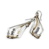 oxidized sterling silver arrow shaped earrings with brass and shiny sterling silver hammered swishes and labradorite gemstones on gold filled wire