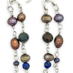 Copper, purple, and indigo blue fresh water pearls, cat's eye and lapis gemstones are suspended between two mini sterling silver hammered arch earrings