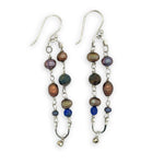 Copper, purple, and indigo blue fresh water pearls, cat's eye and lapis gemstones are suspended between two mini sterling silver hammered arch earrings