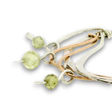 Hammered sterling silver and bronze wire waves pendant with green cubic zirconia dangles and a sparkly sterling silver tube chain necklace