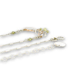 Hammered sterling silver and bronze wire waves pendant with green cubic zirconia dangles and a sparkly sterling silver tube chain necklace