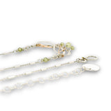 Hammered sterling silver and bronze wire waves pendant with green cubic zirconia dangles and a sparkly sterling silver tube chain necklace