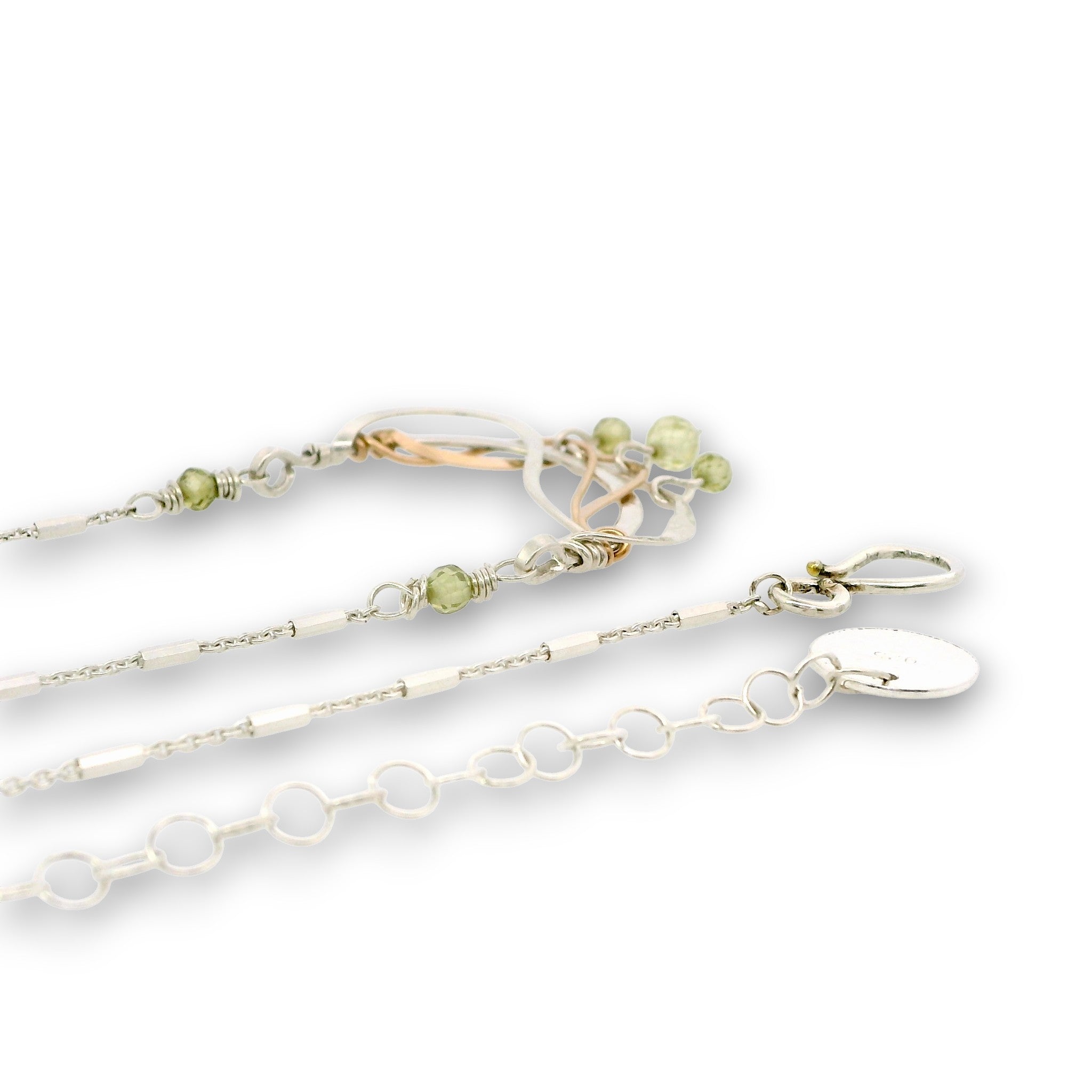 Hammered sterling silver and bronze wire waves pendant with green cubic zirconia dangles and a sparkly sterling silver tube chain necklace