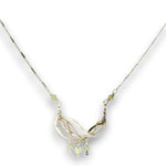 Hammered sterling silver and bronze wire waves pendant with green cubic zirconia dangles and a sparkly sterling silver tube chain necklace