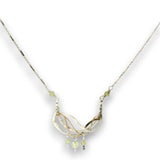 Hammered sterling silver and bronze wire waves pendant with green cubic zirconia dangles and a sparkly sterling silver tube chain necklace