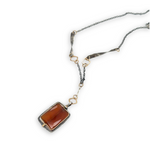 hessonite garnet faceted rectangle in oxidized sterling silver box on a chain made of gold filled squares, oxidized handmade hammered twisted bars and chain necklace