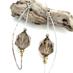 Sterling silver skinny arch earrings with a large hexagonal smokey quartz gemstone with pyrite and brass wire accents.