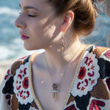 Sterling silver skinny arch earrings with a large hexagonal smokey quartz gemstone with pyrite and brass wire accents.