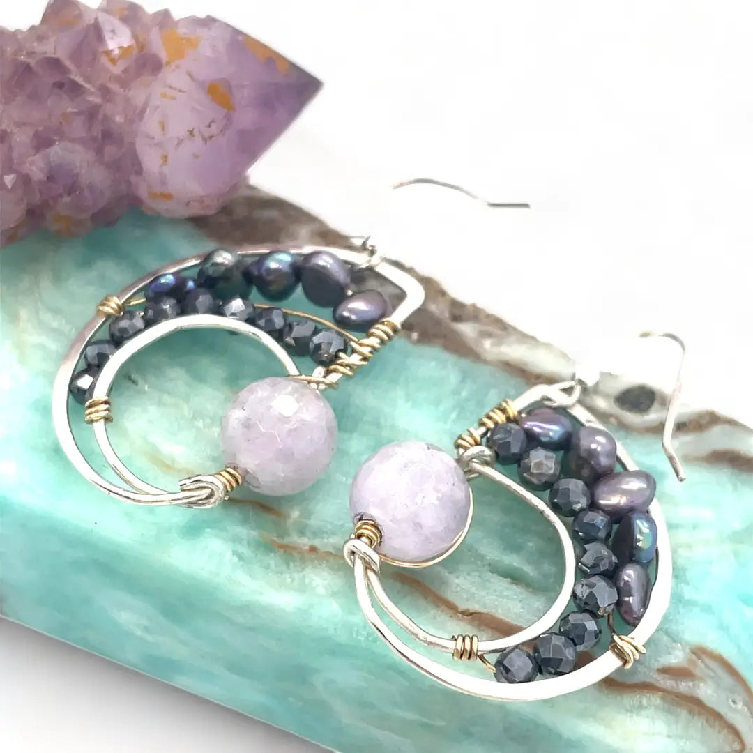 Amethyst, purple fresh water pearl, and pyrite gemstones embellish a sterling silver small earrings with gold filled wire