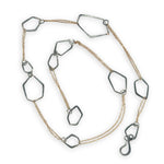 darkened sterling silver hammered geometric shapes held within gold filled delicate doubled up chain necklace