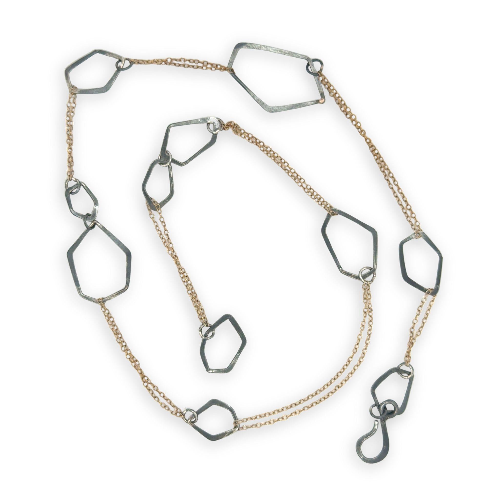 darkened sterling silver hammered geometric shapes held within gold filled delicate doubled up chain necklace