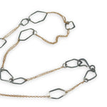darkened sterling silver hammered geometric shapes held within gold filled delicate doubled up chain necklace