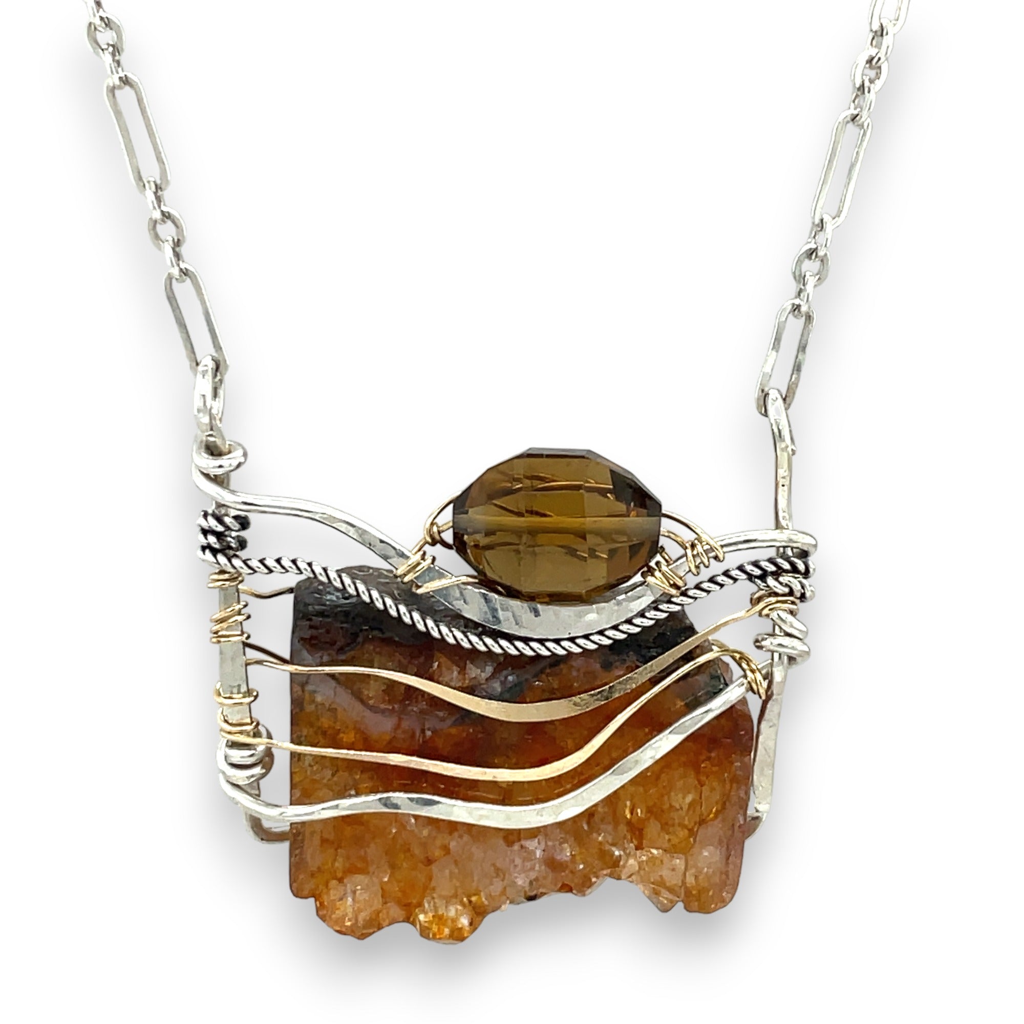 Orange rough cut quartz slab gemstone held within sterling silver and gold-filled pendant necklace. Smokey quartz and oxidized sterling silver twist accent. Pyrite built into sterling silver chain