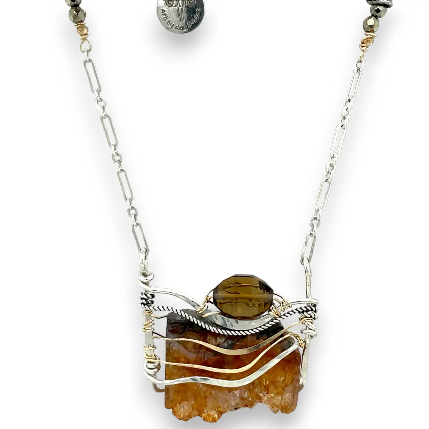 Orange rough cut quartz slab gemstone held within sterling silver and gold-filled pendant necklace. Smokey quartz and oxidized sterling silver twist accent. Pyrite built into sterling silver chain