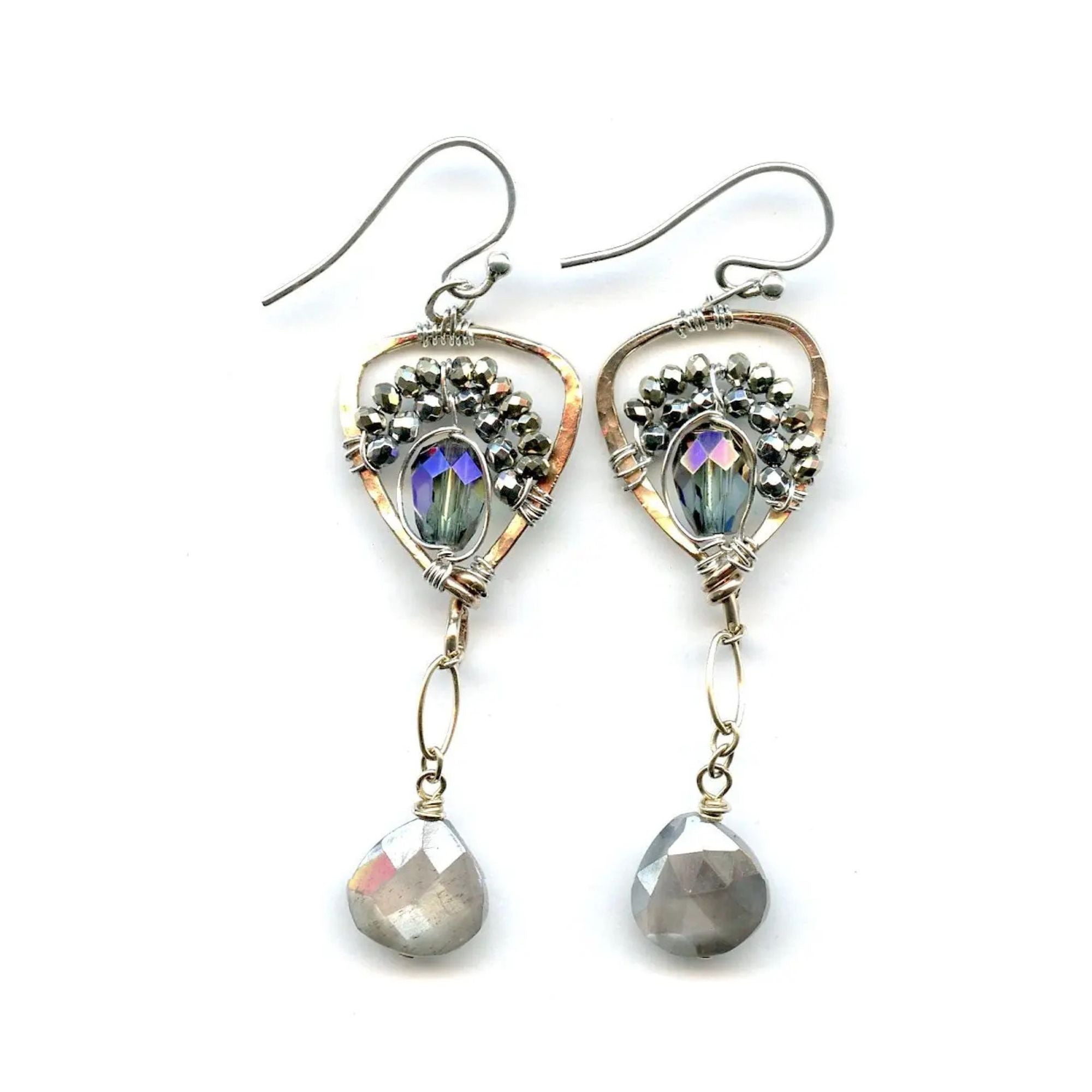 Faceted moonstone drops hang from a mini bronze hot air balloon shaped earring with blue crystal and pyrite gemstones