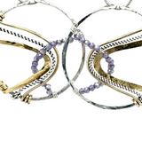 Sterling silver handmade hoop with lavender cubic zirconia stones weaved within brass and oxidized sterling silver twisted wire