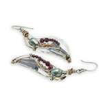 Crystal, garnet, and pyrite gemstones decorate sterling silver wing earrings with bronze accents