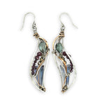 Crystal, garnet, and pyrite gemstones decorate sterling silver wing earrings with bronze accents