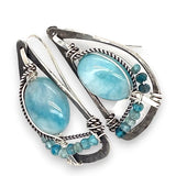 oxidized sterling silver semi circle earrings featuring smooth larimar ovals and apatite gemstones with built in earring hooks that wear like a post earring
