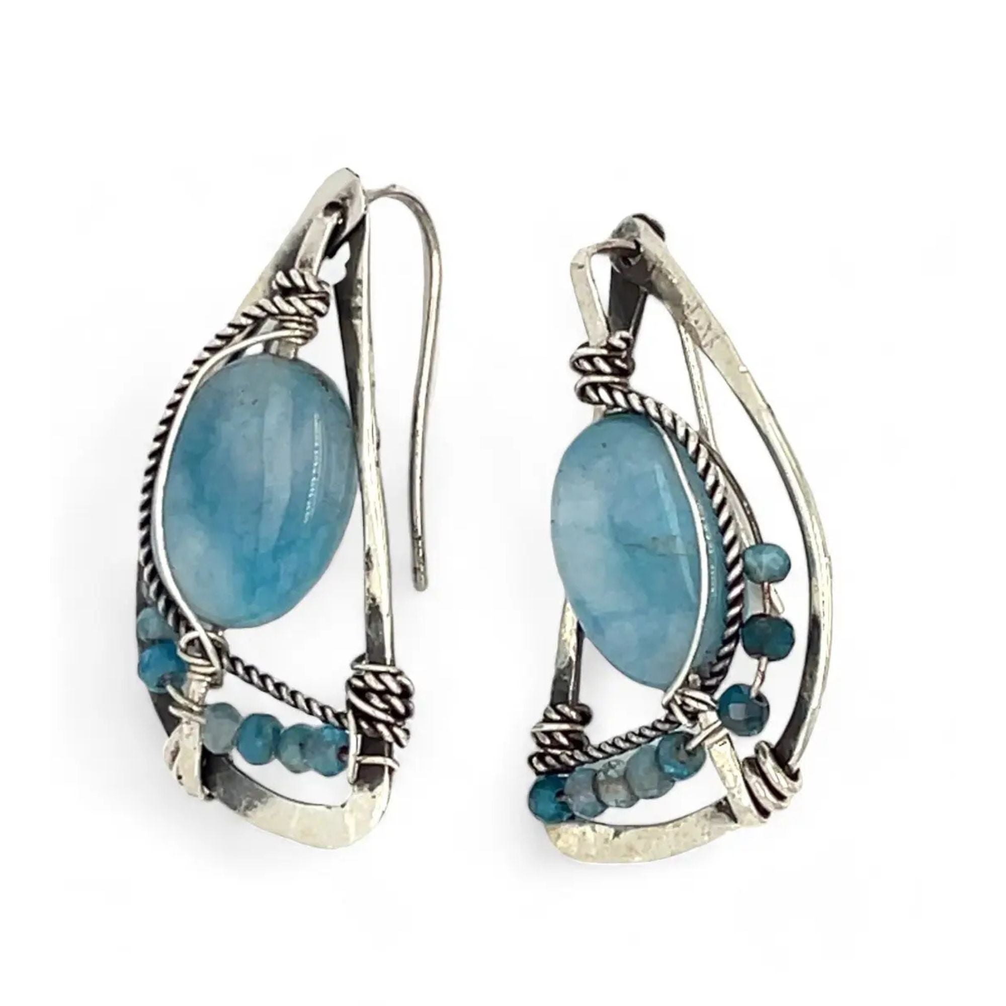 oxidized sterling silver semi circle earrings featuring smooth larimar ovals and apatite gemstones with built in earring hooks that wear like a post earring