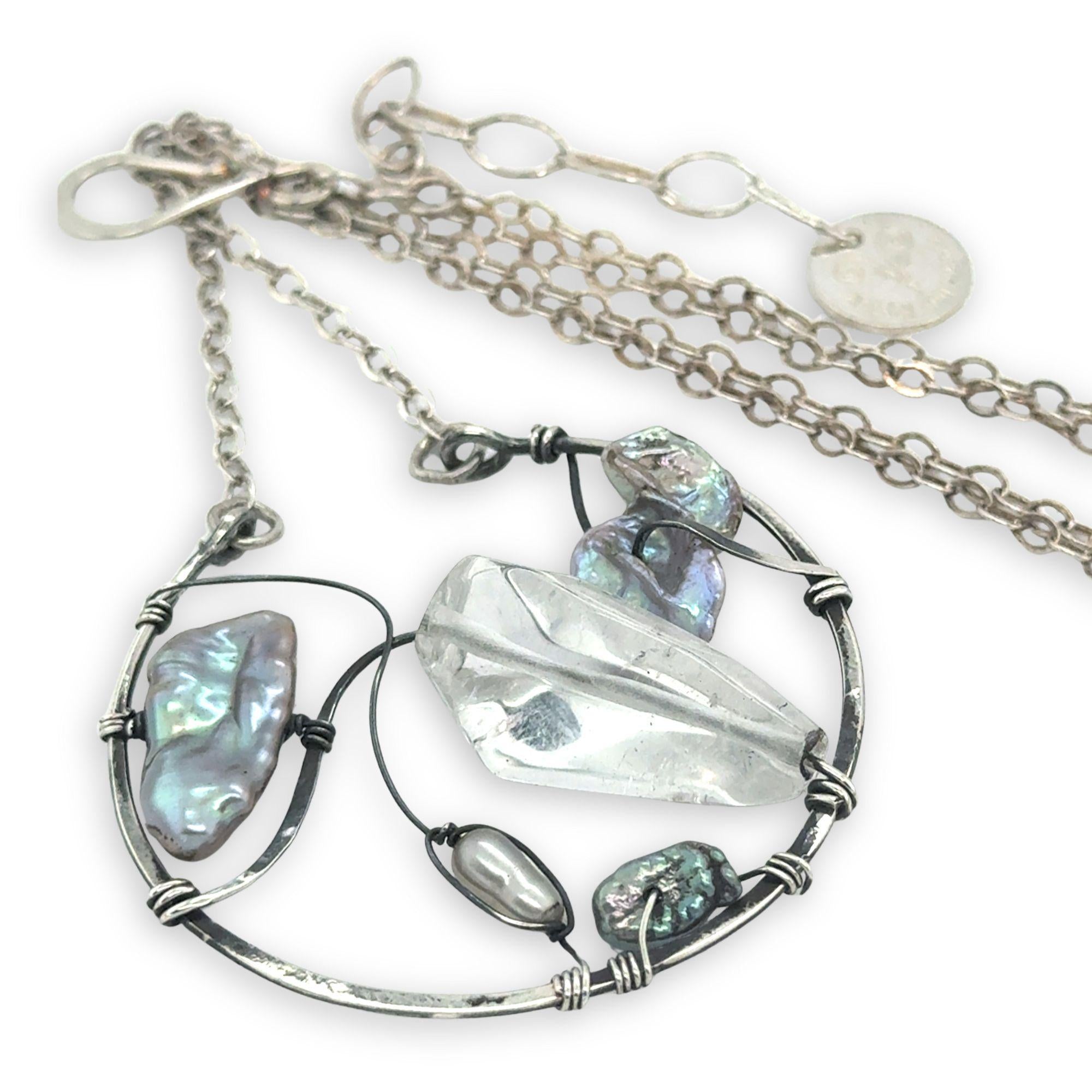 Raw quartz nugget and silver blue fresh water pearl variety embellished an oxidized sterling silver hoop necklace on a dainty chain necklace