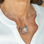 Raw quartz nugget and silver blue fresh water pearl variety embellished an oxidized sterling silver hoop necklace on a dainty chain necklace