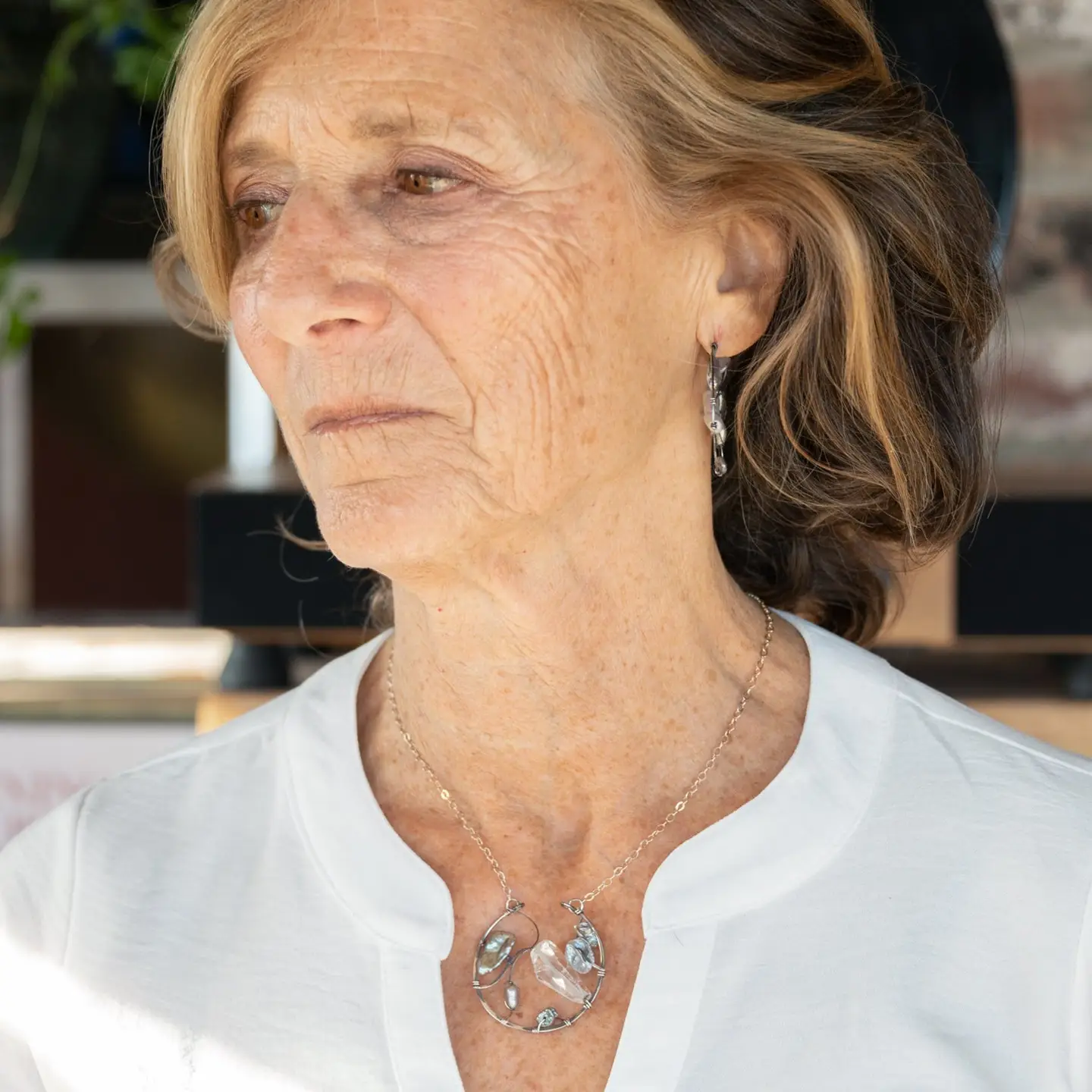 Raw quartz nugget and silver blue fresh water pearl variety embellished an oxidized sterling silver hoop necklace on a dainty chain necklace